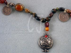 Antique-silver-Tibetan-Pendant-with-beautiful-Tiger-Eyes-details-sold