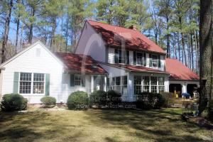 Ouour house/studios with new deck add on in the making by Christina Jarmolinski