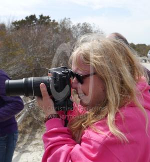 Christina photographing on the Island by Rob de Koter