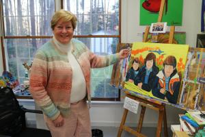Cindy with her Family Portrait at the Keukenhof, Holland by Christina Jarmolinskii