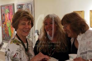 three artists discussing the show