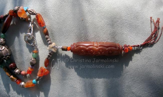 Carved Carnelian Bead from Tibet designed by Christina Jarmolinski