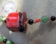 Herkimer Diamond with Antique Coins and Coral Bead by Christina Jarmolinski