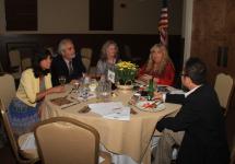 Profesor Jin Chul with artists at the art auction