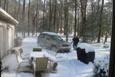 Rob, trying to get rid of some of the snow with a leafblower!