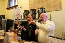 Sophika and Rick, owners of the Corner Shoppe in Snowhill, MD admiring Christina's Little Secrets