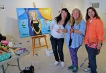 Christina and her 2 visitors at the Art Competition