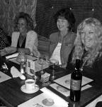 Three artists enjoying the Entertainment and a good bottle of Chianti