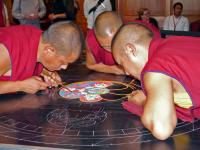3 Tibetan Monks starting the Sand Mandala Day 1