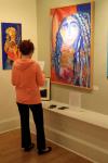 visitor viewing the Blue Angel by Christina Jarmolinski