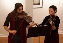 Students playing Holiday Tunes at the Art Show Opening